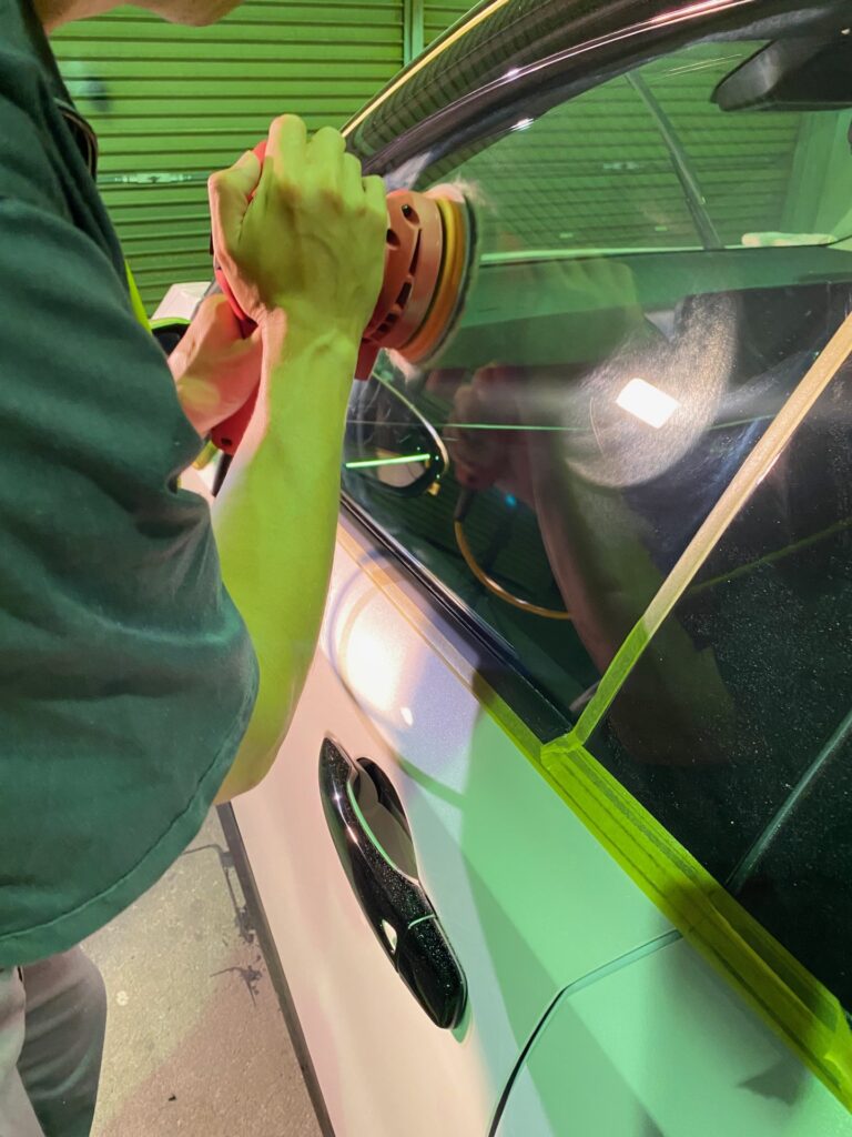 Water spot removal from side window glass by polishing